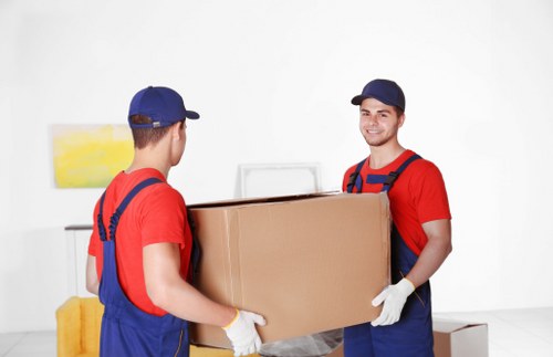 Flat removals in Crewshill with moving boxes and careful loading