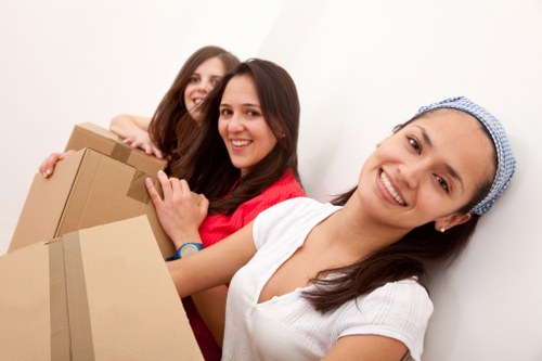 Crewshill packing team preparing fragile household items for moving